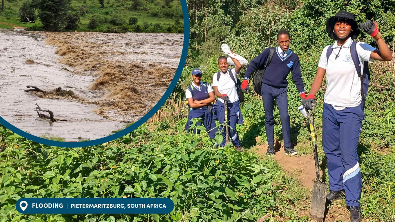 Group of smiling students in blue uniforms walk on a lush, green path. Inset shows a flood with brown, rushing water. Location: Pietermaritzburg, South Africa.