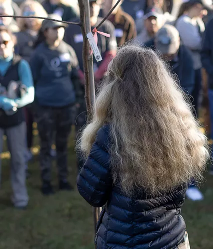 community organizer addressing group of volunteers