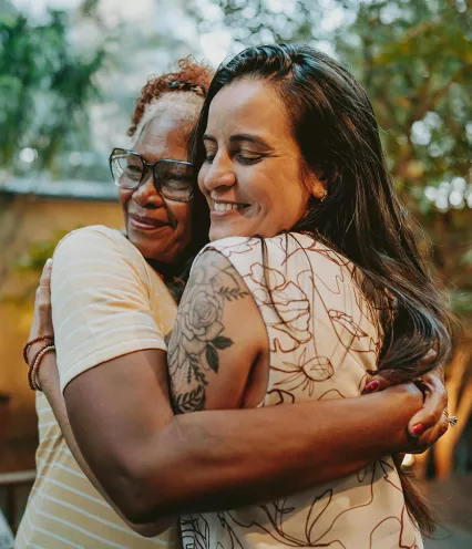 mother and daughter hugging